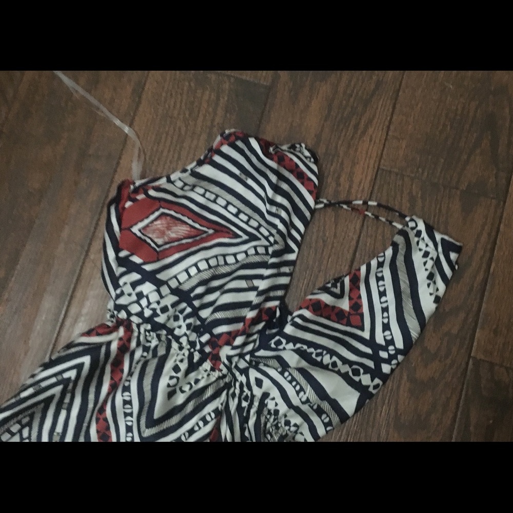 Romper - Deep V-neckline.